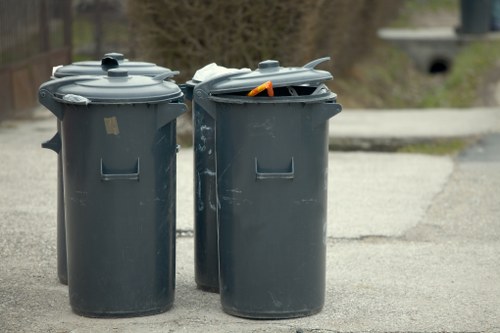 Construction site with workers managing waste materials